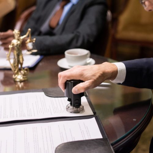 business-professionals-reviewing-legal-documents-a-2026-01-08-22-43-12